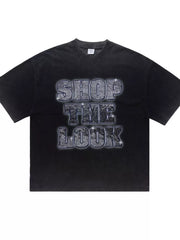 Black acid-wash cotton t-shirt with "SHOP THE LOOK" graphic print