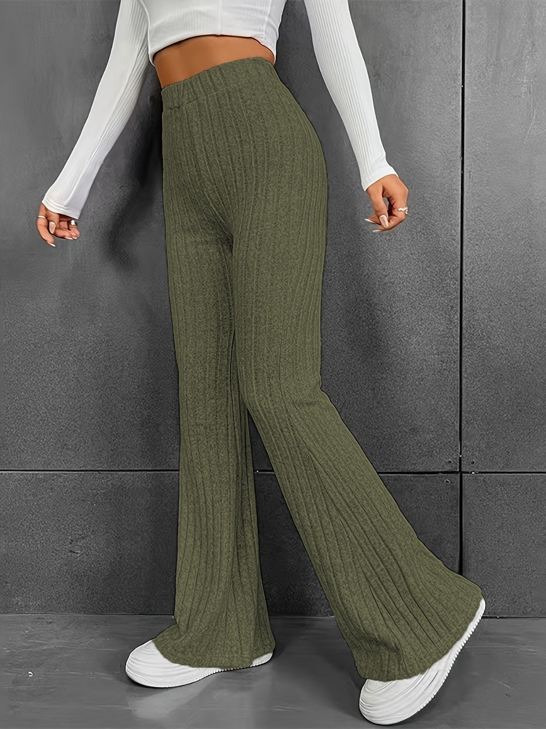 Sculpted ribbed flare trousers in Matcha Green, polyester, with a high waist and wide leg.