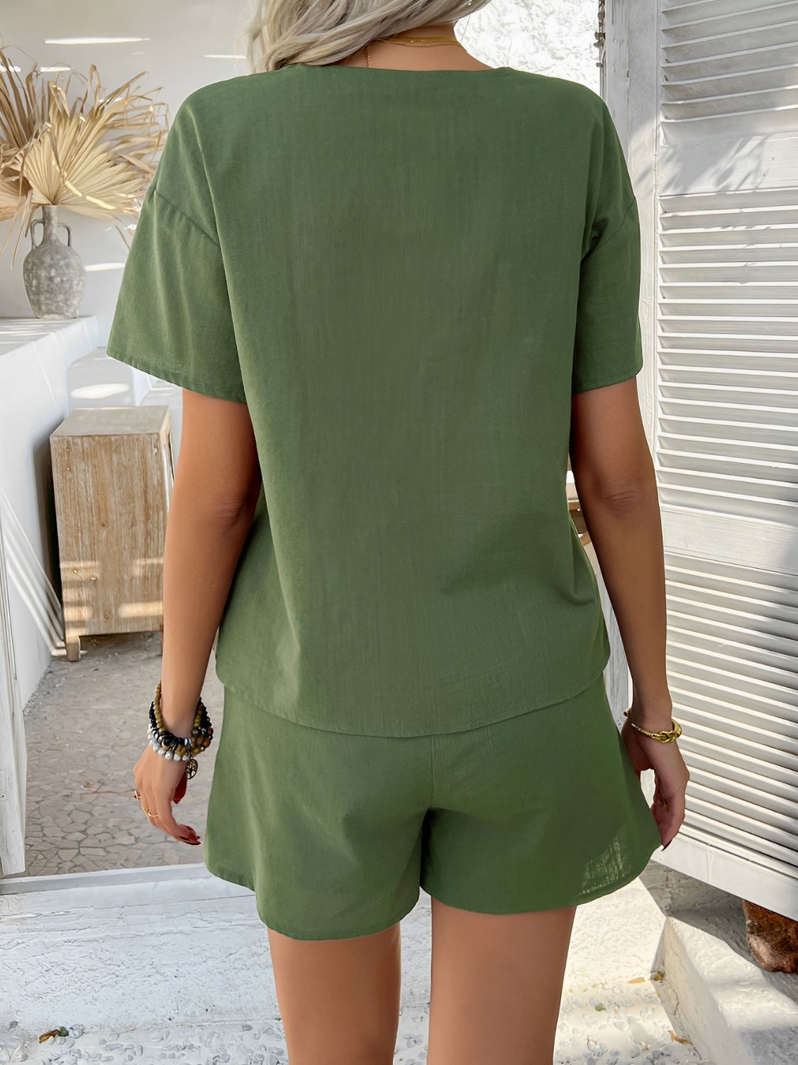 Moss linen tie-front top and shorts set with short sleeves and relaxed fit.