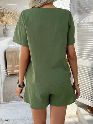Moss linen tie-front top and shorts set with short sleeves and relaxed fit.