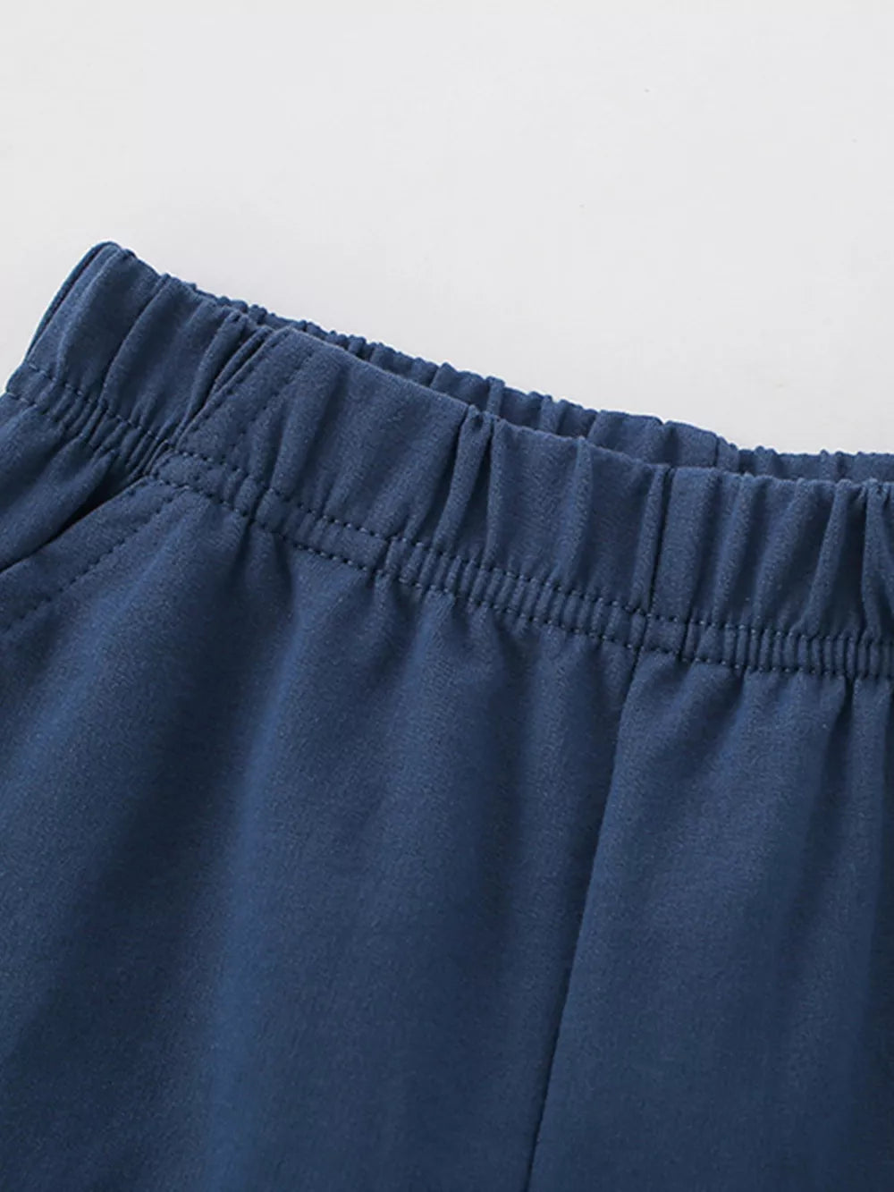 Baby boys' navy blue cotton shorts with elastic waistband and pockets