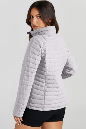 Gray quilted stand collar puffer jacket with horizontal stitching detail.