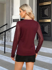 Burgundy waffle knit top with lattice detail long sleeves.