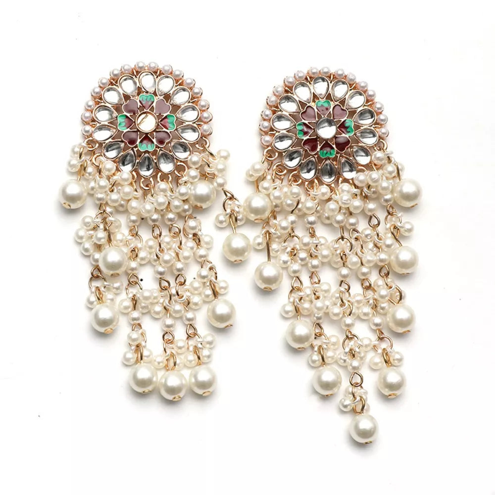 Lustrous pearl fringe statement earrings with floral detail and clear stones.