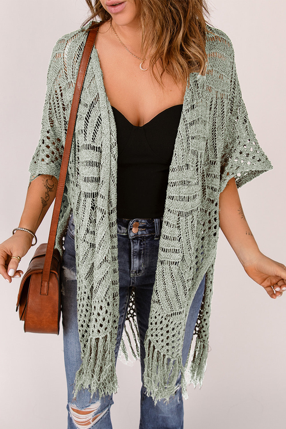 Sage open knit chevron fringe cardigan with short sleeves and boho styling.