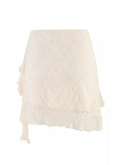 Cream lace mini skirt with asymmetrical ruffled hem and delicate details.