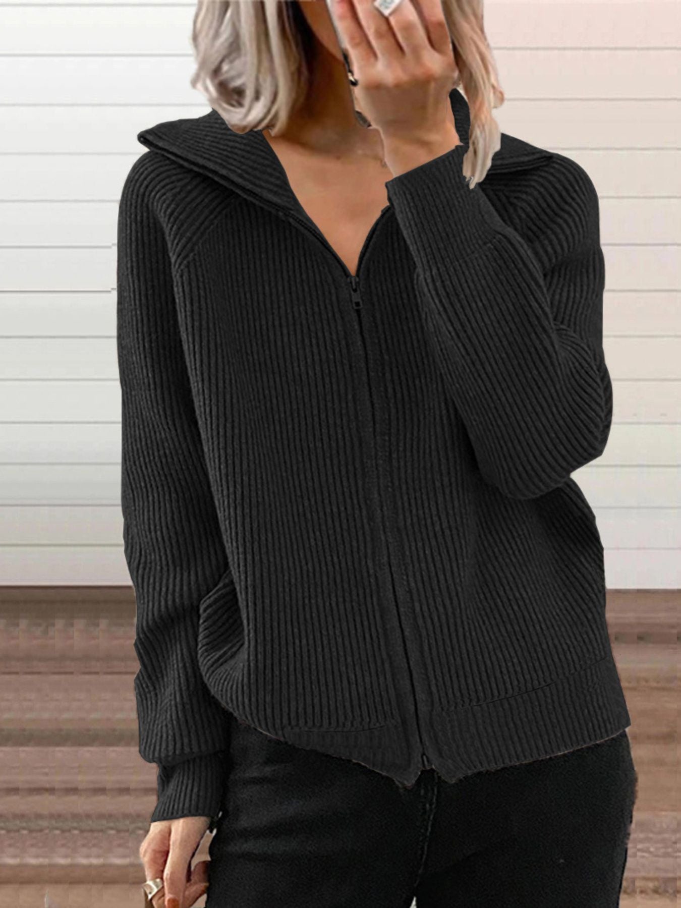 Black ribbed knit plus size trench coat with zip front and collar.