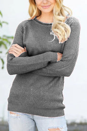 Dark Gray textured raglan pullover sweater with honeycomb knit and crew neck.