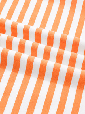 Oversized cotton t-shirt with orange and white stripes, 3/4 sleeves.