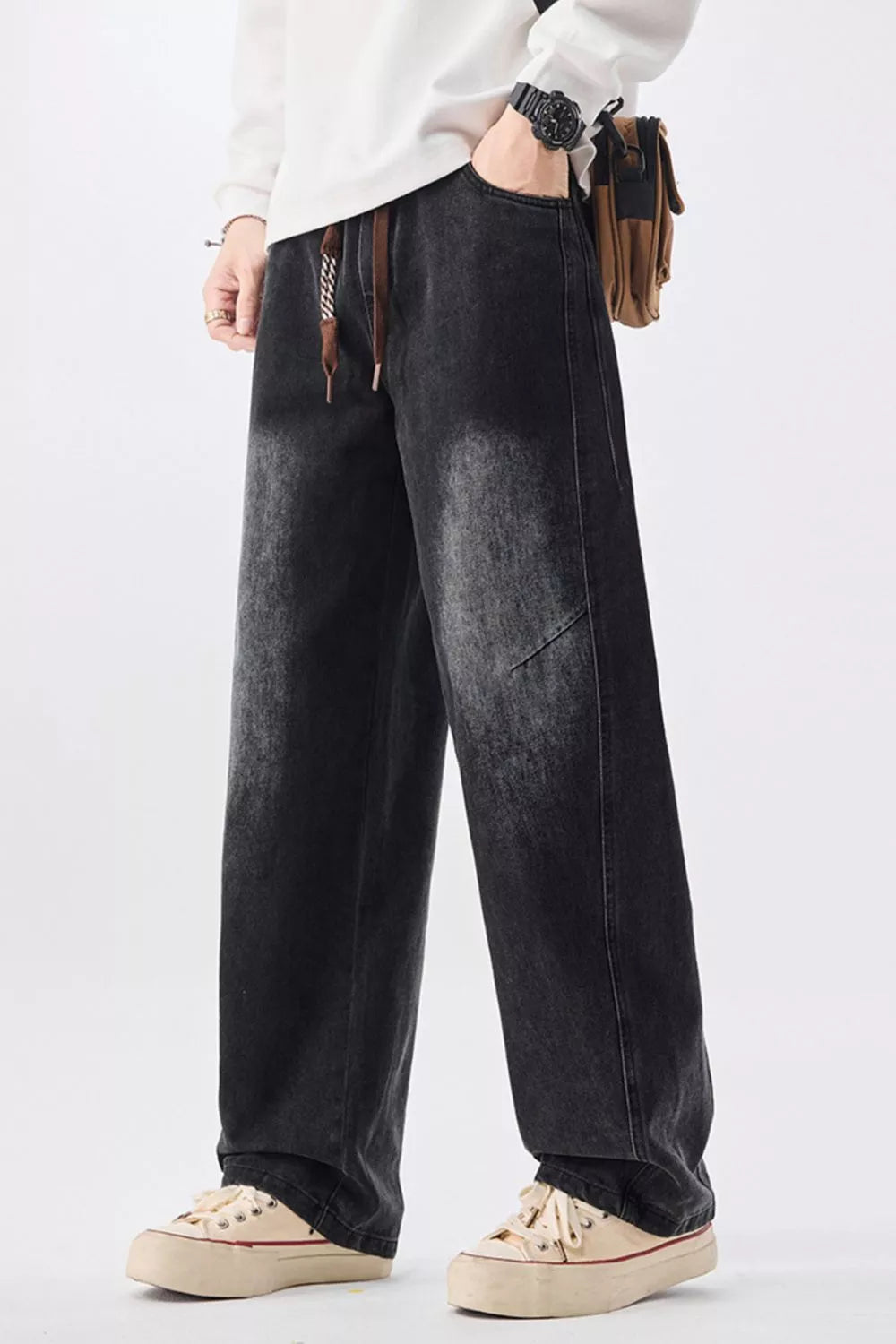 Men's black vintage wash wide-leg denim jeans with drawstring waist