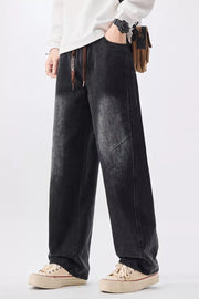 Men's black vintage wash wide-leg denim jeans with drawstring waist