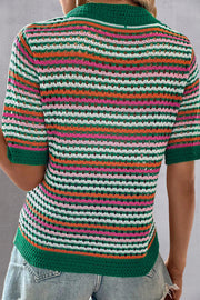 Open-knit striped mock neck top with green trim and short sleeves.