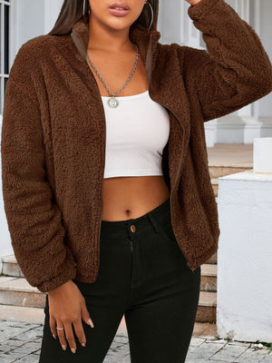 Brown sherpa bomber jacket with zip front and stand-up collar.