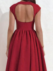Deep red cap sleeve a-line midi dress with a back cutout and boat neck.