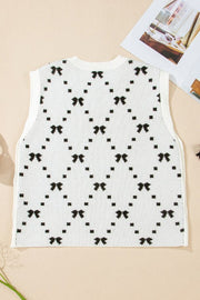 White knit tank sweater with black diamond bow pattern