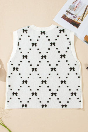 White knit tank sweater with black diamond bow pattern