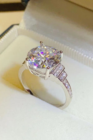 Radiant cut halo sterling ring with pave diamond band.