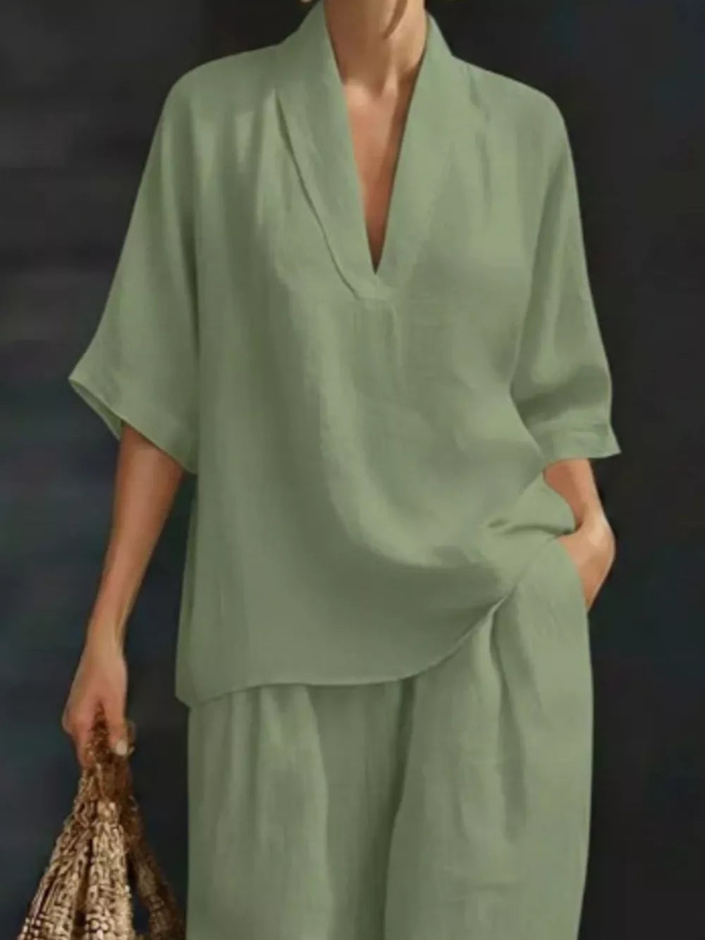 Light green half-sleeve top with V-neck and wide-leg pants set.