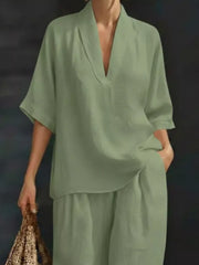 Light green half-sleeve top with V-neck and wide-leg pants set.