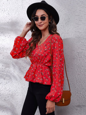 Red floral peplum blouse with gathered waist and balloon sleeves