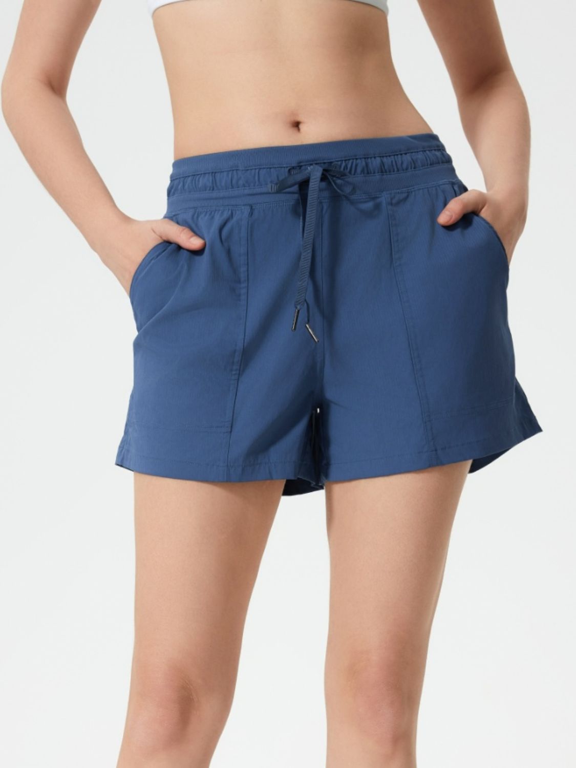 Dusty blue utility shorts with drawstring waist and pockets