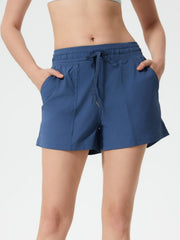 Dusty blue utility shorts with drawstring waist and pockets