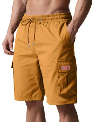 Mustard adjustable cargo shorts with drawstring waist and side cargo pockets.