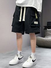 Men's black lightweight cargo shorts with drawstring and multiple pockets.