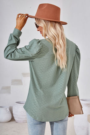 Sage textured bishop sleeve blouse with puff shoulders