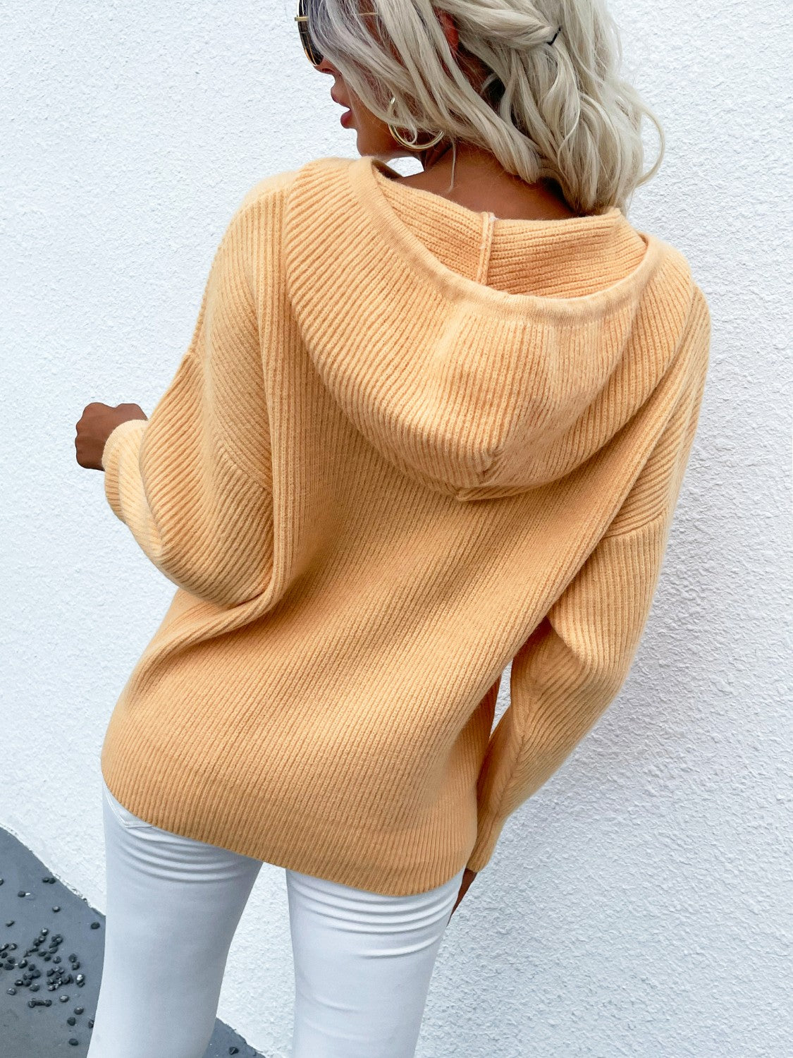 Yellow textured knit cocoon hoodie with a relaxed fit and hood.