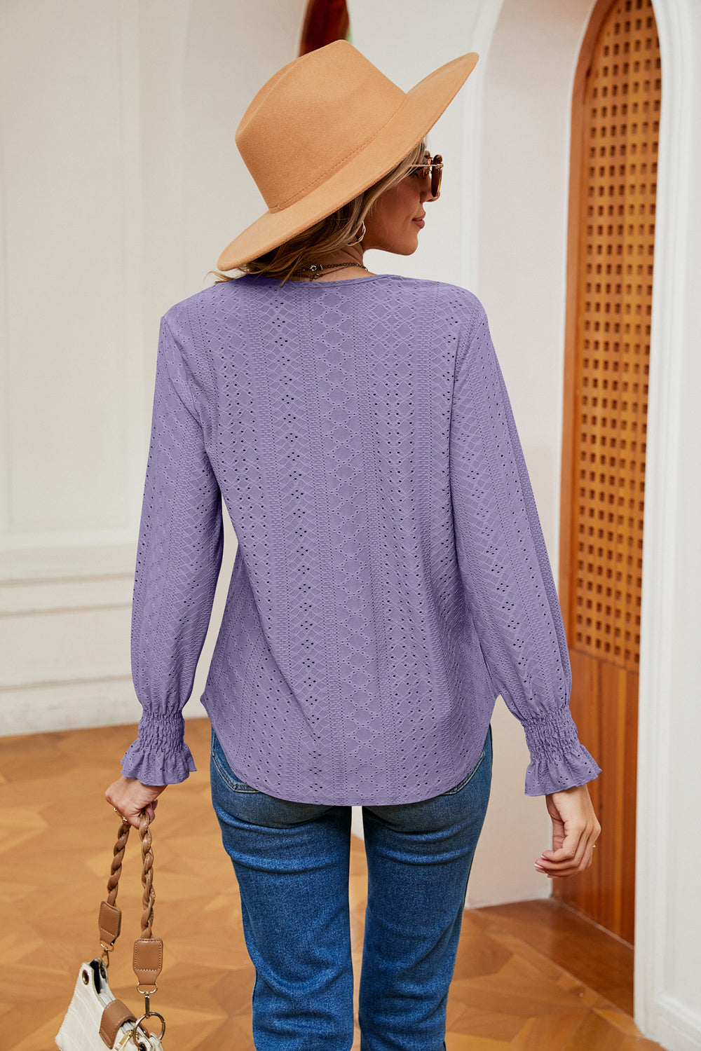 Lavender eyelet blouse with lace trim and ruffle cuffs, long sleeves.