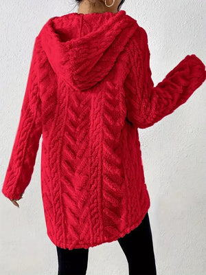 Red textured fleece hoodie with cable knit pattern and drawstring hood.
