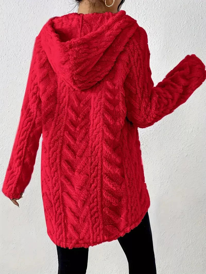 Red textured fleece hoodie with cable knit pattern and drawstring hood.