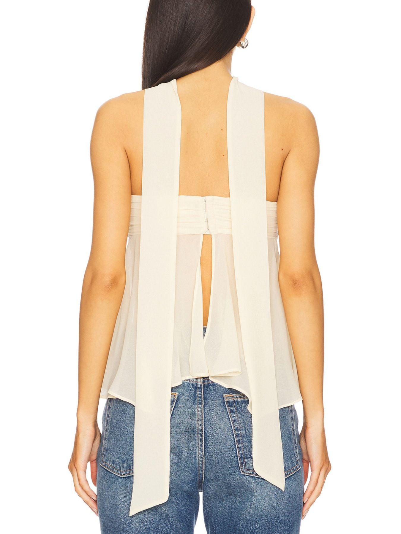 White asymmetrical sheer blouse with elegant scarf detail and open back