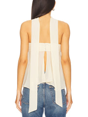 White asymmetrical sheer blouse with elegant scarf detail and open back