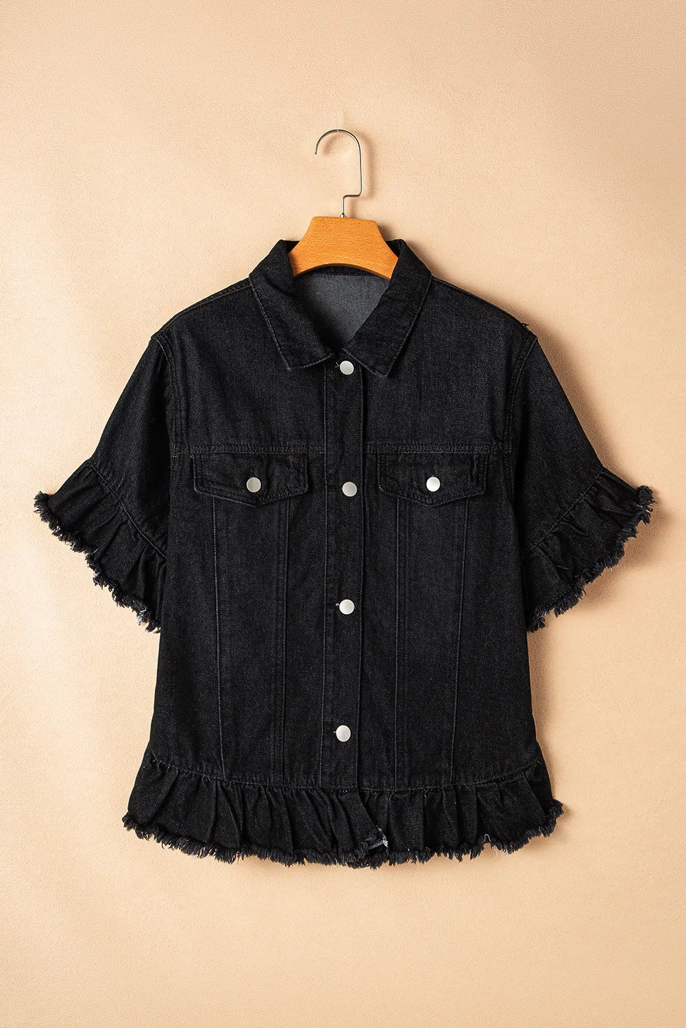 Black denim jacket with short ruffled sleeves and hem