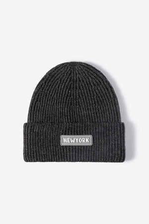 Dark Gray ribbed acrylic beanie with New York patch detail.