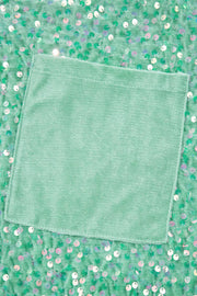 Sequin embellished dolman sleeve top in gum leaf green with a velvet pocket detail.
