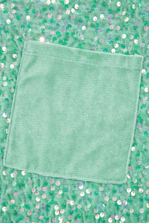 Sequin embellished dolman sleeve top in gum leaf green with a velvet pocket detail.
