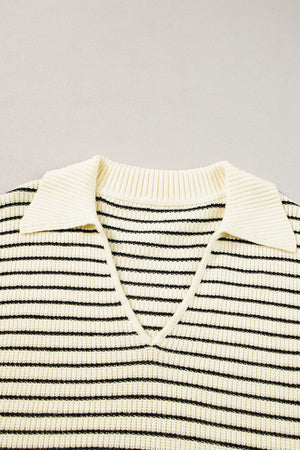Ivory and black striped knit polo vest with a V-neck and pointed collar.