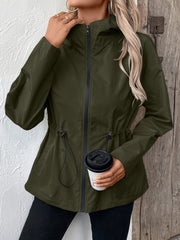 Army green utility jacket with cinched waistline and hood.