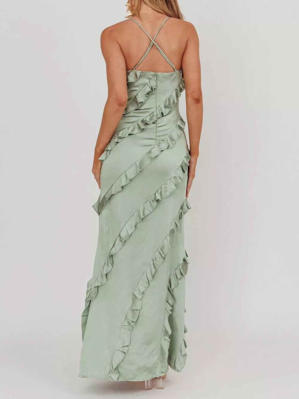 Sage spaghetti strap maxi dress with diagonal ruffles and criss-cross back.