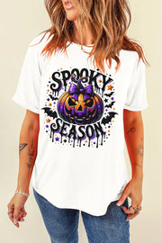 White oversized tee with a spooky pumpkin and bat print for Halloween season.