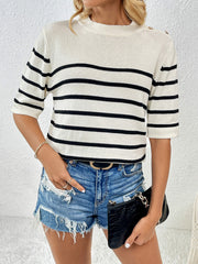 Cream and black striped knit top with button shoulder detail and short sleeves.