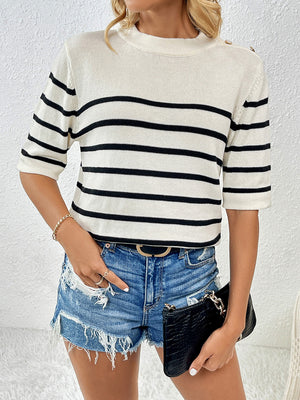 Cream and black striped knit top with button shoulder detail and short sleeves.