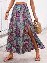 Paisley print maxi skirt in deep purple with a high slit and bohemian style