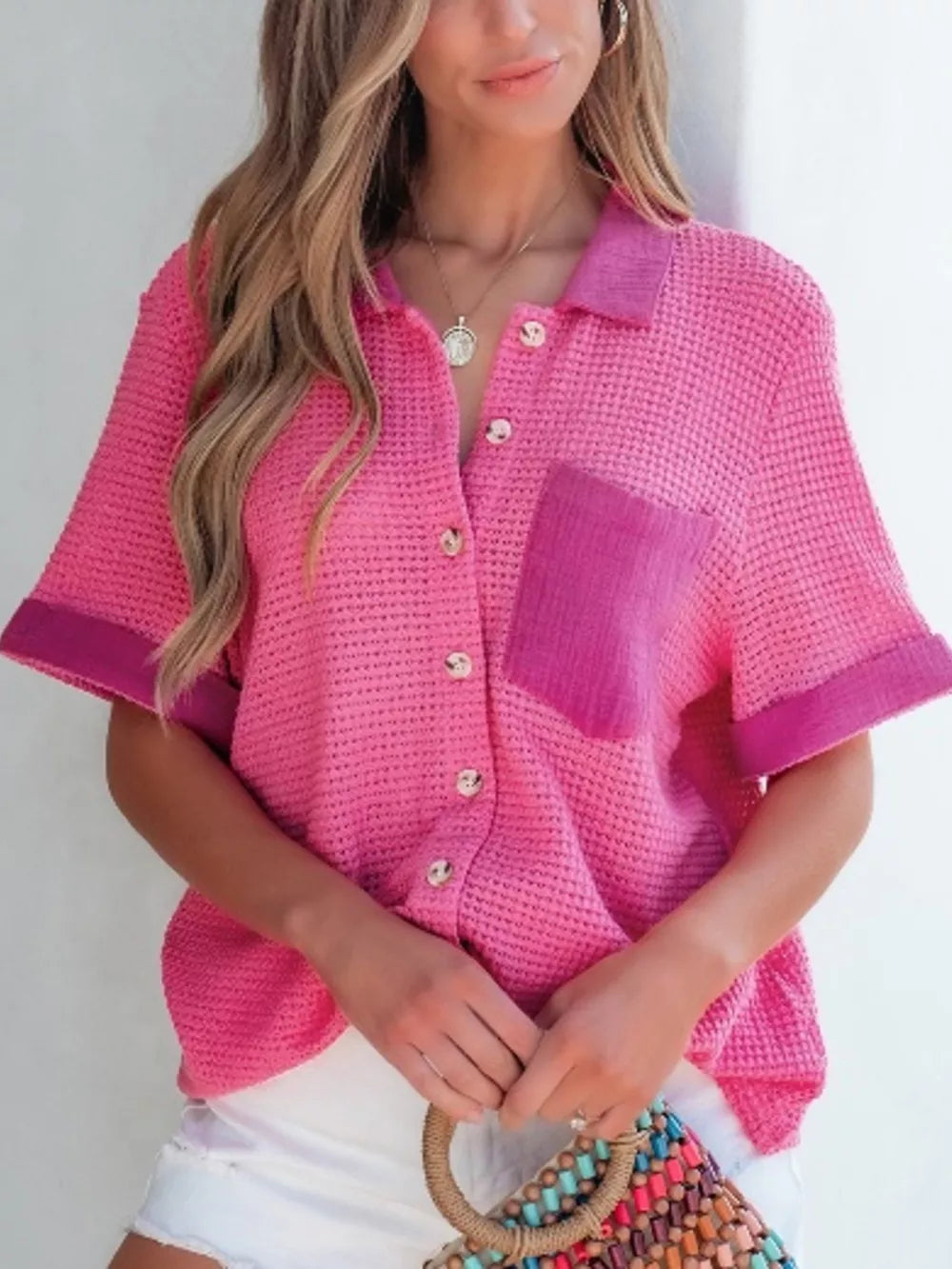 Waffle-knit button-down shirt in cerise with a contrast pocket and cuffs.