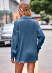 Textured gauze overshirt in sky blue with relaxed silhouette and button cuffs.