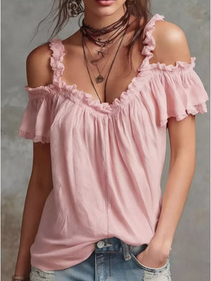 Pink ruffled cold shoulder shirt with deep V-neck and short sleeves.