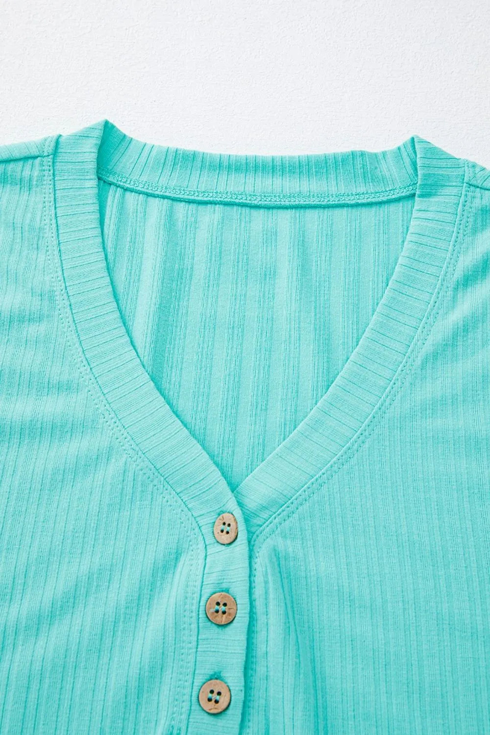 Ribbed Henley tank in Tiffany Blue with V-neck and wooden buttons.